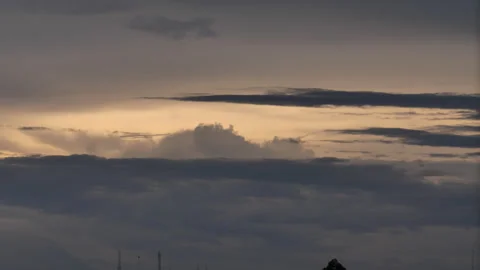 Sunset clouds layers transforming, pastel golden hour time-lapse sky Stock Footage 346162550