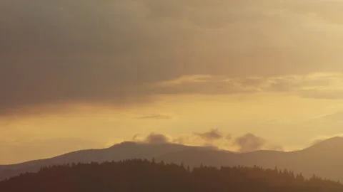 Sunset clouds in the mountains Stock Footage 245097365