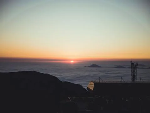 Sunset clouds mountains sky skyline. Stock Photos