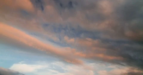 Sunset clouds move in the sky Time-lapse Stock Footage 89474971