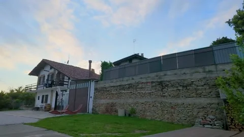 Sunset Clouds Moving Over a Traditional House in Piedmont Italy Stock Footage 335195123