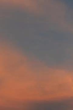 Sunset Clouds in Orange and Blue Stock Photos