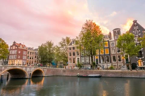 Sunset clouds over the Amsterdam Canal Stock Photos