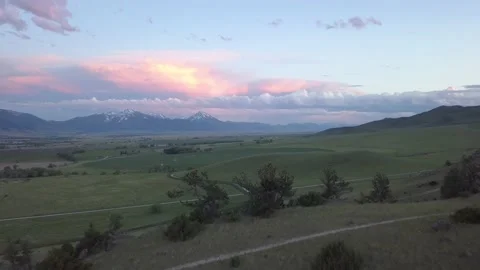 Sunset clouds over distant mountains Stock Footage 166273500