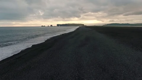 Sunset in the clouds over a famous beach in Iceland. Andreev. Video stock 78208244