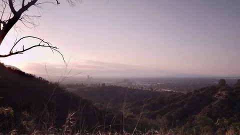 Sunset clouds over Forest Lawn and Burbank Disney Warner studios timelapse Stock Footage 96486220