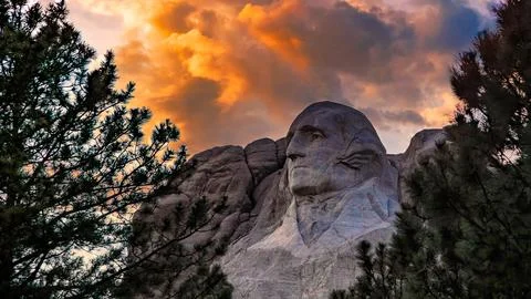 Sunset Clouds over George Washington, Mount Rushmore National Memorial, South Stock Photos