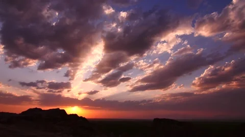 Sunset with Clouds over a Hill Stock Footage 53232790