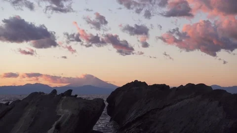 Sunset clouds over Mount Fuji from Jogashima island, Kanagawa Prefecture, Japan Stock Footage 151433343