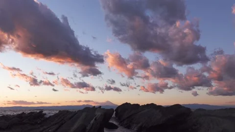 Sunset clouds over Mount Fuji from Jogashima island, Kanagawa Prefecture, Japan Stock Footage 151433358