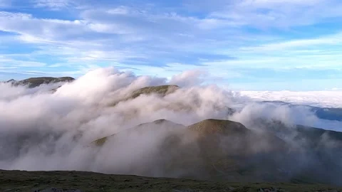 Sunset with clouds over the mountains Stock Footage 142749362