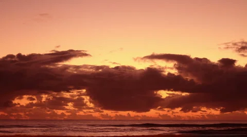 Sunset clouds over ocean. Time Lapse Stock Footage 2975037