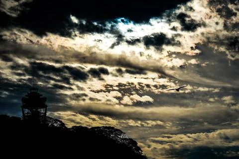 Sunset clouds over the sea Stock Photos