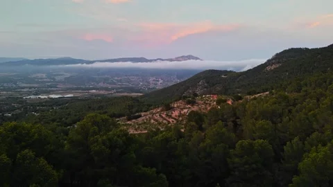 Sunset Clouds Over a Spanish Mountain Valley Stock Footage 314605010