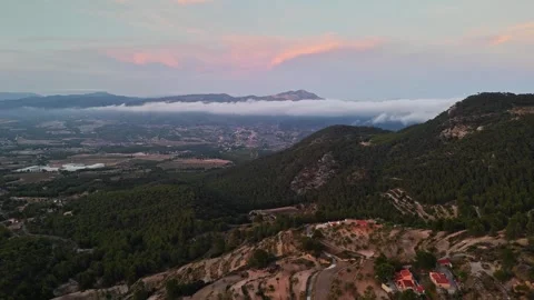 Sunset Clouds Over a Spanish Mountain Valley Stock Footage 314605065