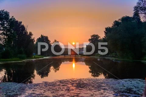 Sunset in clouds Stock Photos