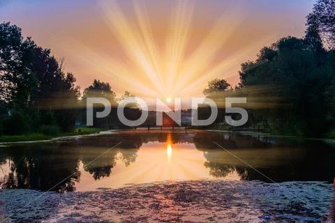 Sunset in clouds Stock Photos