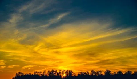 Sunset in clouds Fotos Stock