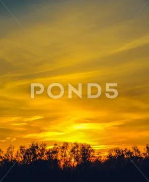 Sunset in clouds Stock Photos