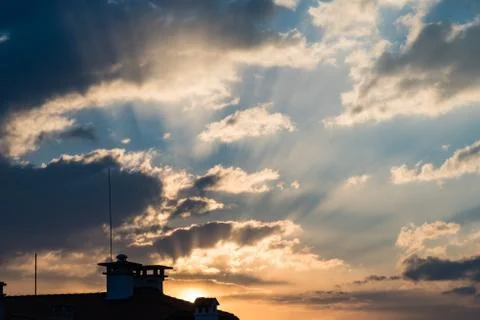 Sunset in clouds Stock Photos