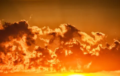 Sunset with clouds Stock Photos