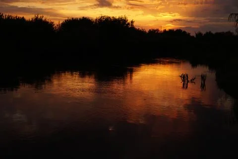 Sunset with clouds Stock Photos