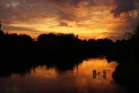 Sunset with clouds Stock Photos