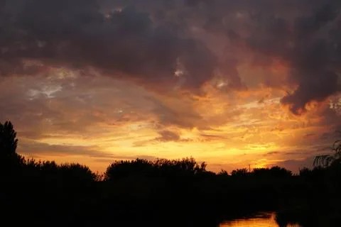 Sunset with clouds Stock Photos