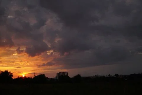 Sunset with clouds Stock Photos