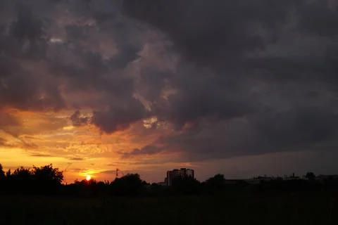 Sunset with clouds Stock Photos