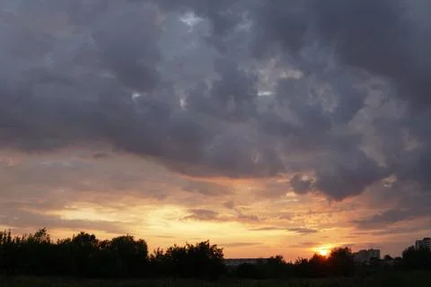 Sunset with clouds Stock Photos
