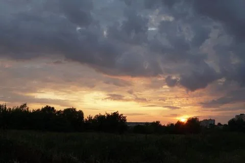 Sunset with clouds Stock Photos
