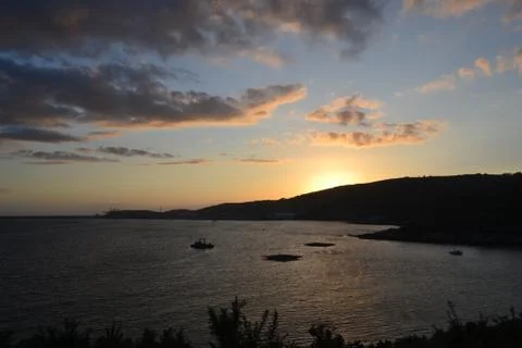 Sunset with clouds Stock Photos