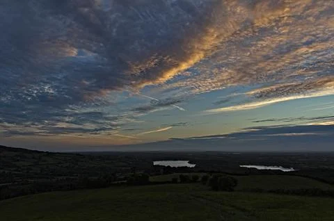 Sunset with clouds Stock Photos