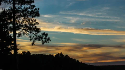 Sunset clouds with plane trail Stock Footage 34360510