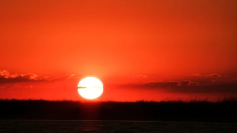 Sunset, clouds. Red sun. PAL Time lapse. Nature shoot Stock Footage 94802697