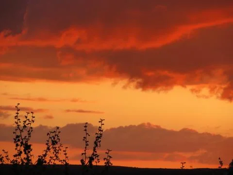Sunset Clouds red sun reflection effect dawn 写真素材