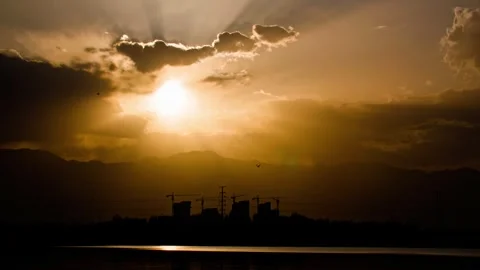 Sunset - clouds on the side of the mountain - time-lapse Stock Footage 257891993