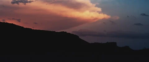 Sunset Clouds With A Silhouette Of The Mountains (Pregraded) Stock Footage 247222350