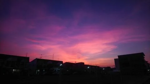 Sunset with clouds in the sky reflection Stock Photos