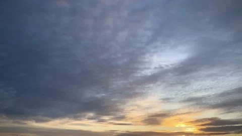 Sunset clouds in the sky time lapse Stock Footage 129028631