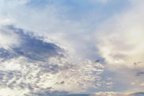 Sunset clouds with sun setting down. Beautiful evening sky with clouds Stock Photos