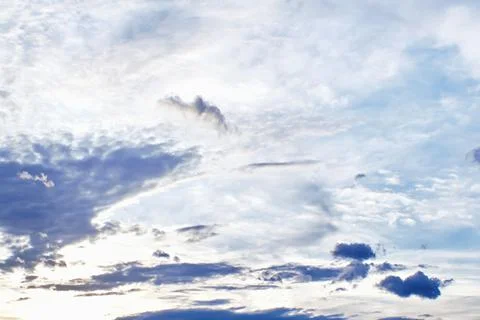 Sunset clouds with sun setting down. Beautiful evening sky with clouds Stock-Fotos