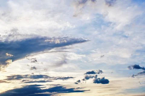 Sunset clouds with sun setting down. Beautiful evening sky with clouds Stock Photos