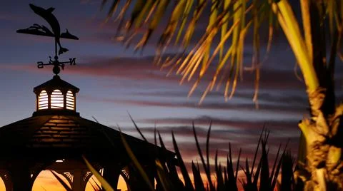 Sunset cloudscape, gazebo on beach, twilight dusk, dramatic sky. Alcove and vane 写真素材