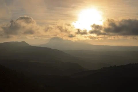 Sunset cloudy landscape Stock Photos