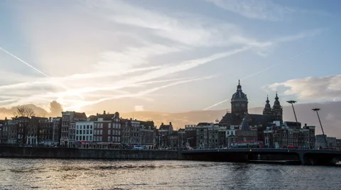 Sunset with cloudy Sky and town near main station with city life timelapse Stock-Footage 48620318