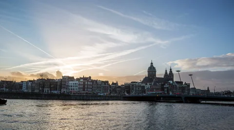 Sunset with cloudy Sky and town near main station with city life timelapse Stock Footage 48620935