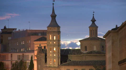Sunset on cloudy sky behind religious monuments and towers Stock Footage 39329984