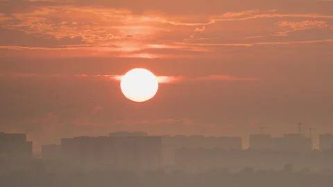 Sunset in a cloudy sky Stock Footage 161781640